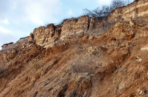 Landslide zone on Black Sea coast. Rock of sea rock shell. Zone of natural di Stock Photos