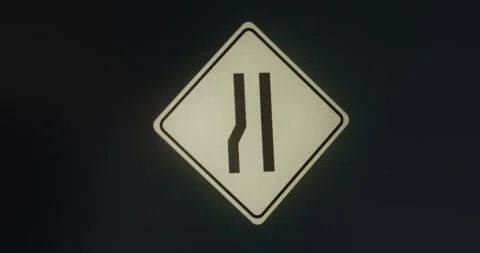 Lane Ends warning road sign Stock Footage 314010752
