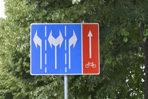Lane layout and bicycle path traffic sign. Stock Photos