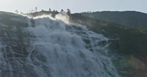Langfossen Waterfall Backlit Mist Over Rock Face, Akrafjorden Norway 스톡 동영상 317087486