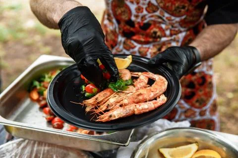 Langoustines cooked with vegetables. Stock Photos