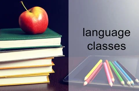 Language classes apple book stack Stock Photos