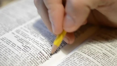 Language study on a english dictionary. student study language. Stock Footage 230248931