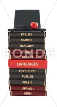 Language text books and laptop Stock Photos