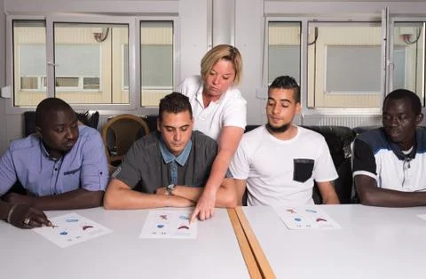 Language training for refugees in a German camp Stock Photos