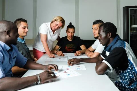 Language training for refugees in a German camp Stock Photos
