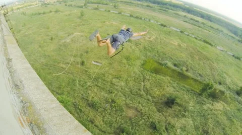 Lanky guy jumps facing forward Stock Footage 68071855