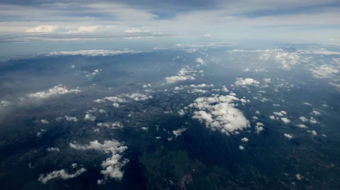 Lanscape beneath clouds at altitude Stock Footage 45349720