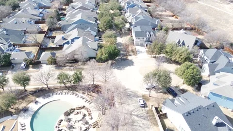 Lantana Trail corridor frames community pool complex with nearby residential Stock Footage 328350730