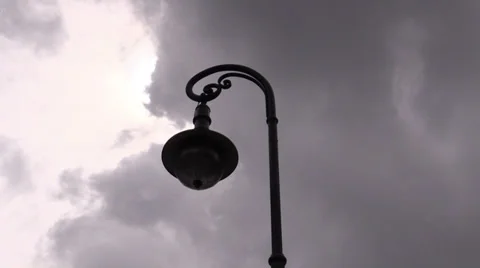 Lantern against floating clouds Stock Footage 38129171