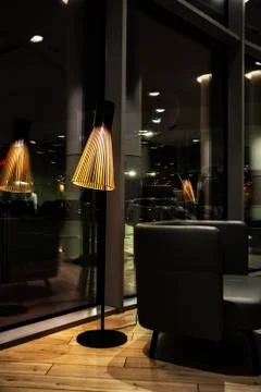 Lantern and its reflection in a dark room Stock Photos