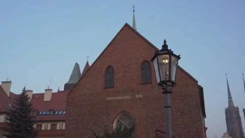 Lantern and old architecture on Ostrow Tumski in Wroclaw Stock Footage 108301563