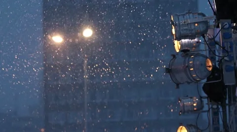 Lantern and spotlights during snowfall at winter evening Stock Footage 52451832