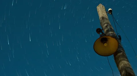 Lantern at background of the night sky with a star trail effect. Time lapse 4k Stock Footage 68084663