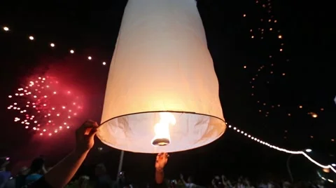 Lantern Being Let Go and Fireworks During Festival. Stock Footage 49773440
