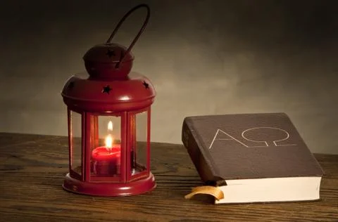 Lantern with bible Stock Photos
