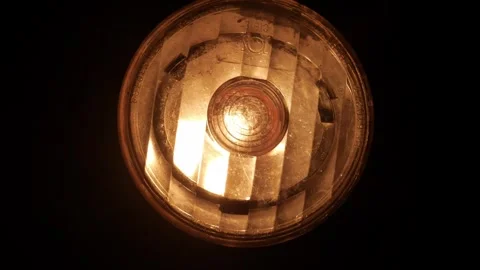 The lantern on the bike glows flicker in the dark. Stock Footage 282304512