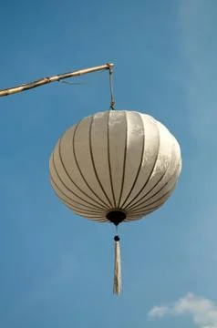 Lantern on blue sky Stock Photos