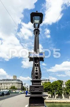 Lantern at bridge with sign Pont notre dame Stock Photos