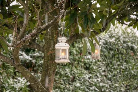 Lantern with candle and snow 02 Stock Photos