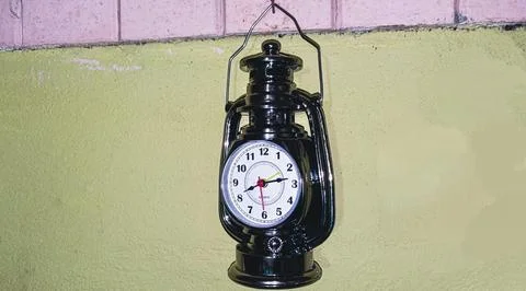 Lantern Clock on Wall Stock Photos