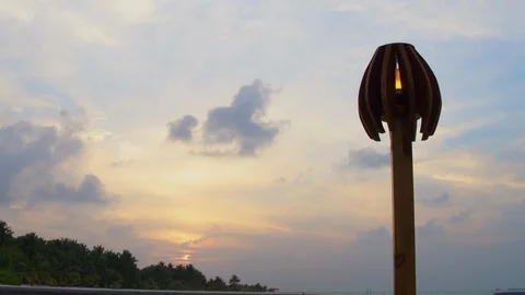 Lantern on the coast. Sunset Stock Footage 104091553