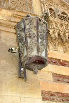 Lantern with engravings and patterns on the wall of the Coptic Christian  church Stock Photos