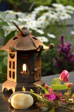 Lantern in garden Stock Photos