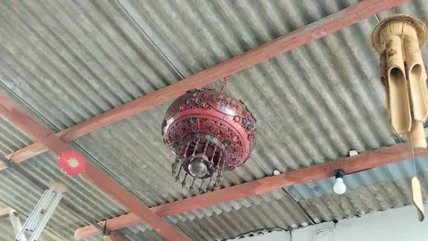 The lantern hanging above is round and red Stock Footage 289923147