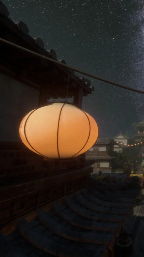 Lantern hanging by balcony under starry sky at night in old town Видео 342338004