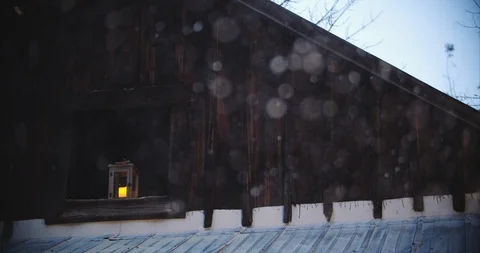 Lantern hung in a barn during a blizzard Stock Footage 97517081