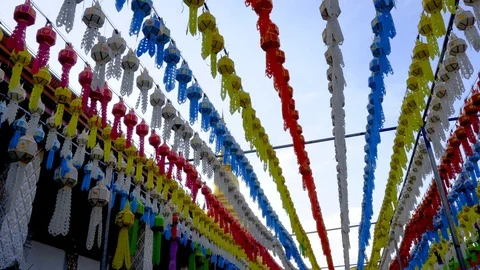 Lantern hung up on the rail to the prosperity in loy krathong festival at wat Stock Footage 98779903
