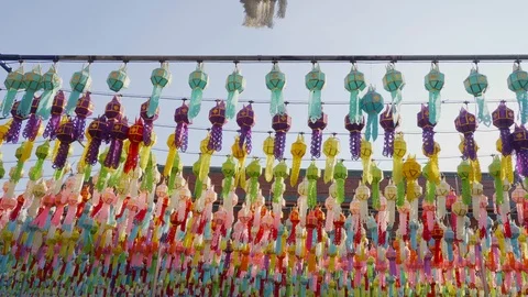 Lantern hung up on the rail to the prosperity in loy krathong festival at wat Stock Footage 98780091