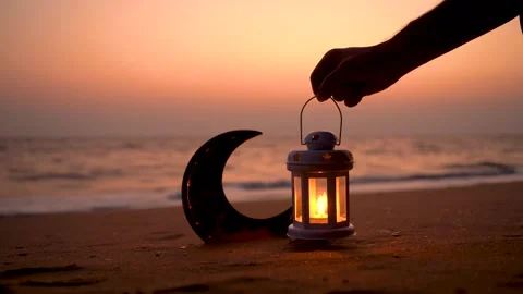 Lantern lamp with Crescent moon shape on the beach Video stock 236090099