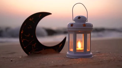 Lantern lamp with crescent moon shape on the beach Video stock 236090101