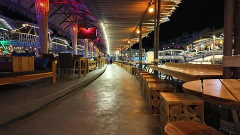 Lantern with a light bulb under a canopy made of bamboo and straw Video stock 309129363