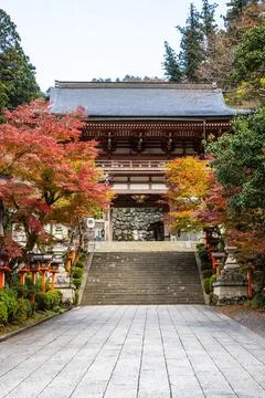 A lantern lined path with stairs leading up the the Kurama-dere Temple north  스톡 사진