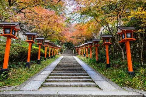 A lantern lined path with stairs leading up the the Kurama-dere Temple north  스톡 사진