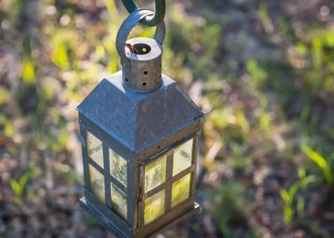 Lantern lit by the sunset Stock Photos
