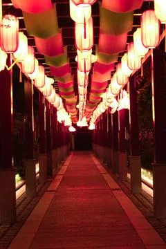 Lantern lit walkway at night Stock Photos