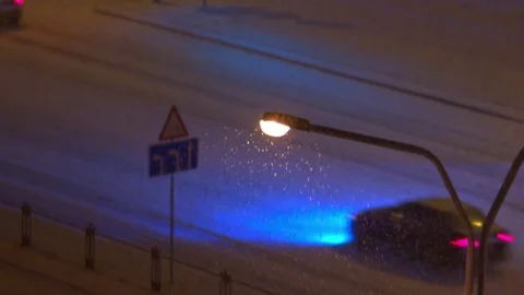 Lantern in the night city, snow Stock Footage 70180492
