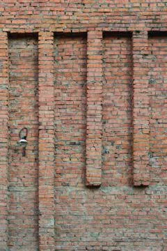 Lantern on an old brick wall Stock Photos