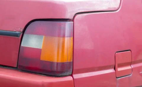 Lantern or reverse signal. The right taillight of a red classic retro car. Th Stock-Fotos