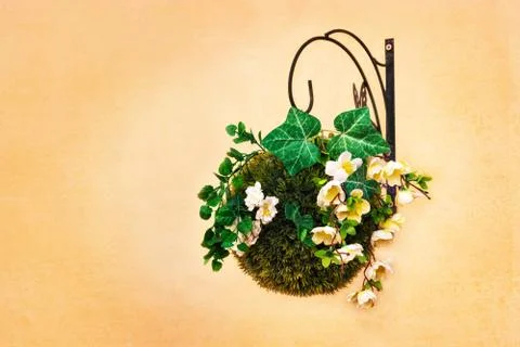 Lantern on an orange background. Stock Photos