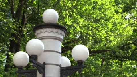 A lantern in the park on a background of foliage Video stock 135477075