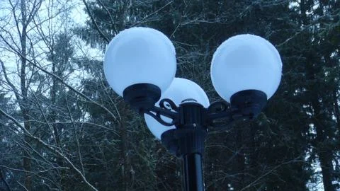 Lantern in the park at daytime in winter Stock Photos