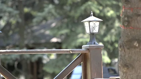Lantern in the park in the summer in sunlight Stock Footage 221274610