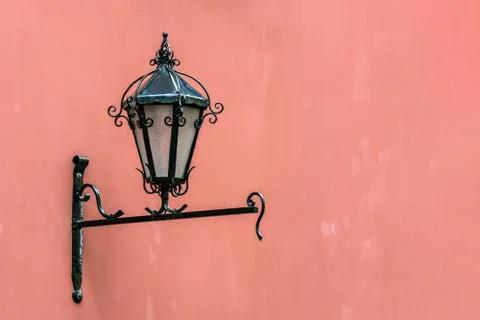 Lantern on the pink wall. Stock Photos