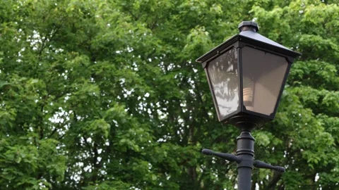 Lantern at pole outside. Summer day. Video stock 315247203