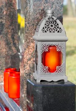 Lantern with a red candle Stock Photos